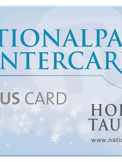 A card with the inscription "National Park Winter Card" and "Bonus Card." It features a wintry design with snowflakes on a light blue background.